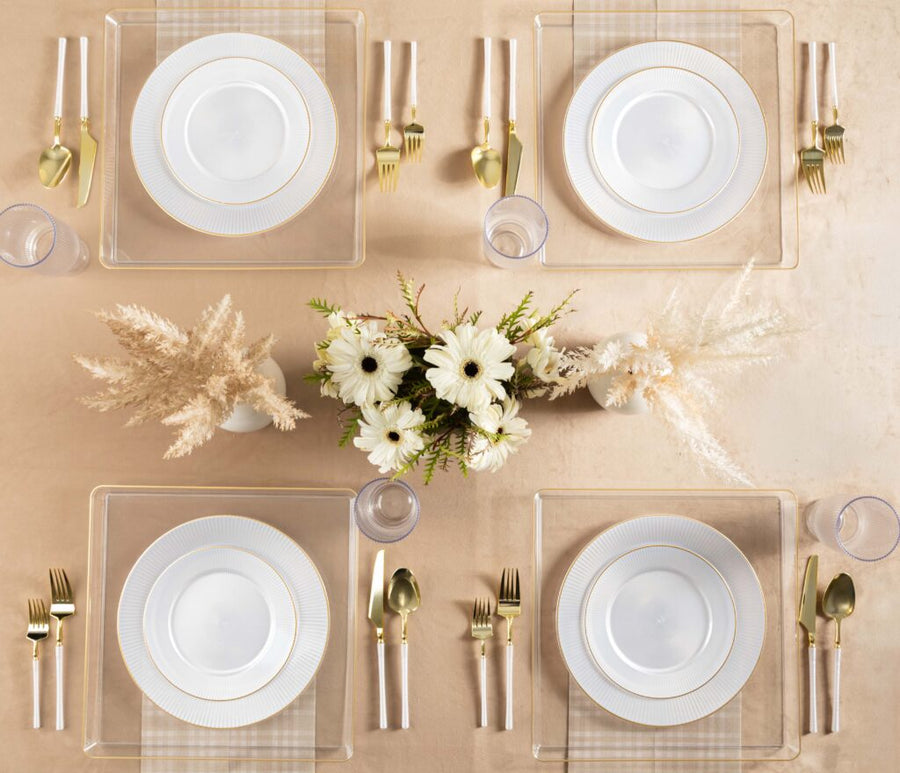 Linear Collection pearl plates with gold rim, table set from above