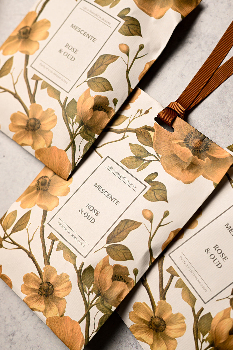 Mescente Rose and Oud scented sachet box close up