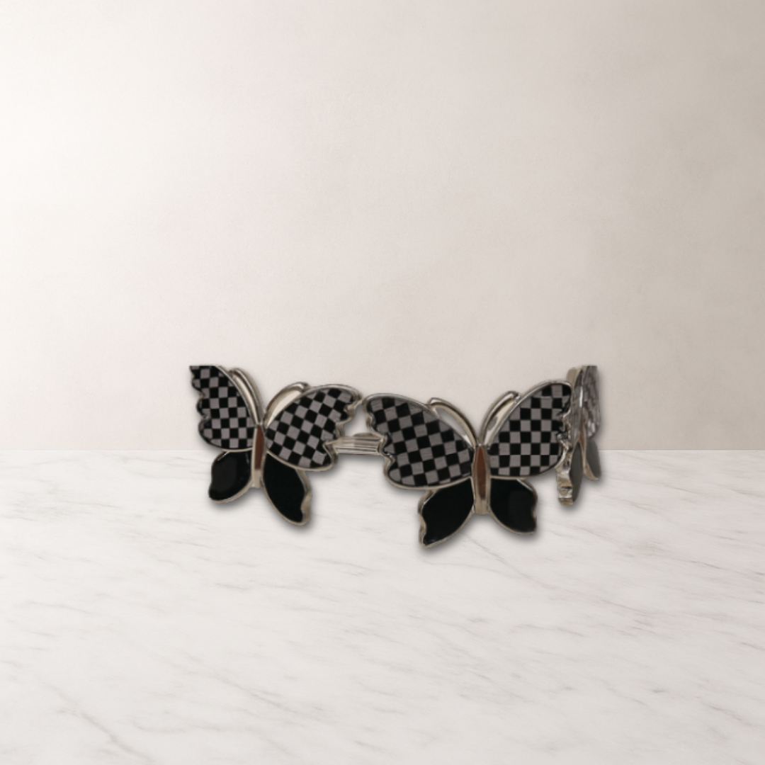 Monarch Black and Silver Checkered Napkin Ring - 4 Count