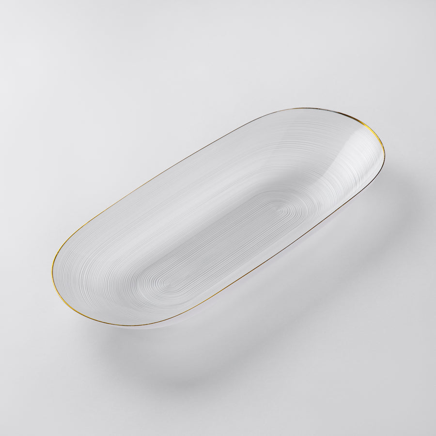 Clear oval plastic serving bowl with gold rim