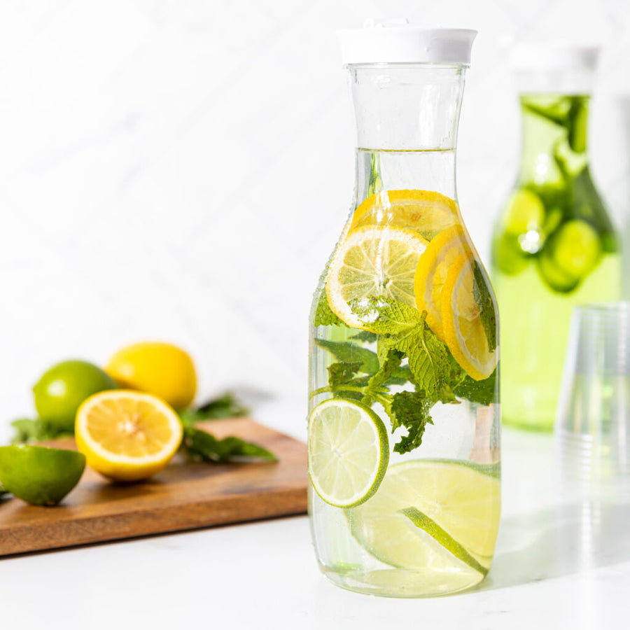 Pitcher With White Lid 50 oz filled with citrus infused water - The Closeout Connection