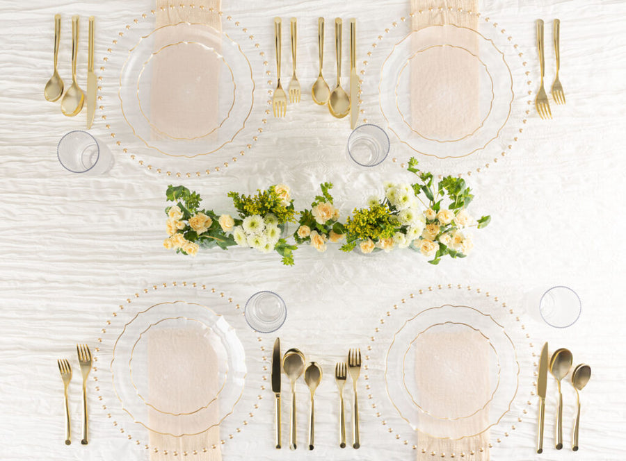 Aristocratic Clear & Gold Rim plates on a set table - The Closeout Connection