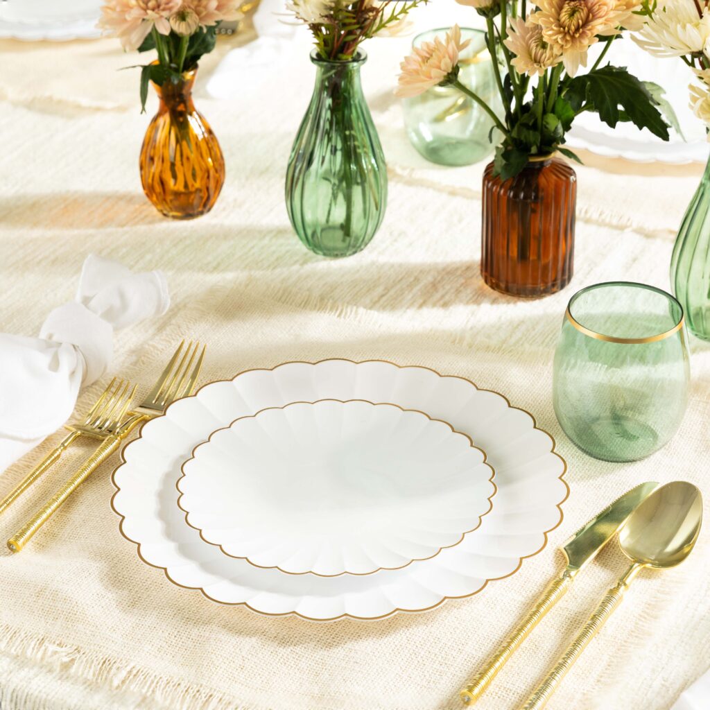 Chantilly Dinnerware white scalloped plates with gold rim on a set table#Color_White-Gold