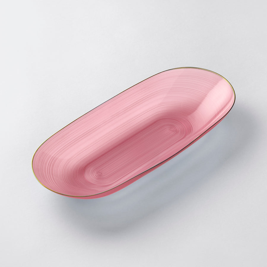Pink oval plastic serving bowl with gold rim 