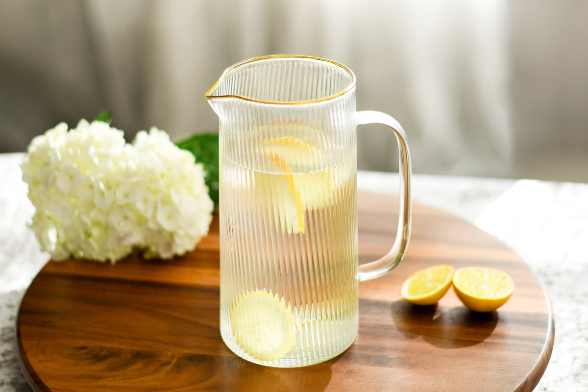 Ribbed Glass Pitcher 52 oz with Gold Rim styled with lemon water - The Closeout Connection#Color_Clear-Gold